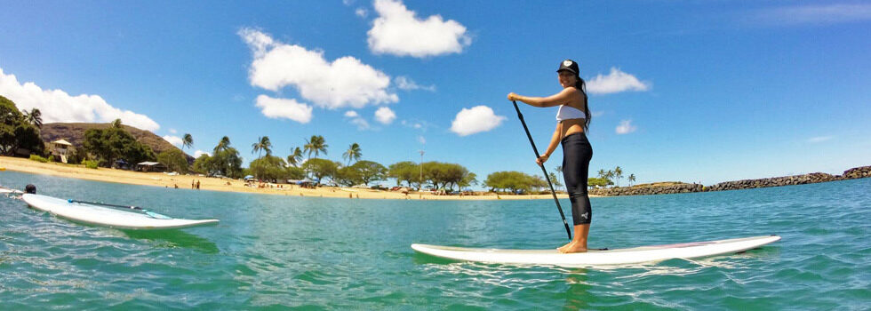 How Can I Learn To Paddleboard In Hawaiis Calm Waters?