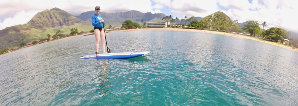 How Can I Learn To Paddleboard In Hawaiis Calm Waters?