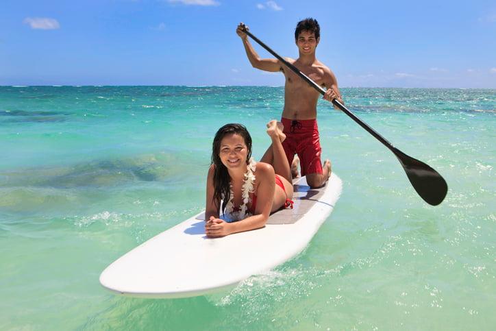 How Can I Learn To Paddleboard In Hawaiis Calm Waters?