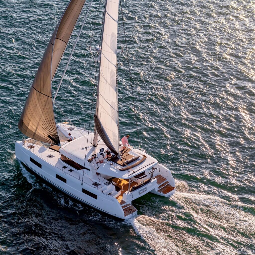 Where Can I Take A Catamaran Sail To Explore The Coastline?