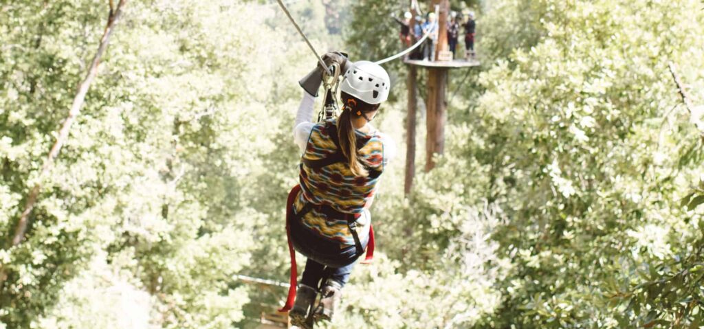 How Can I Experience The Thrill Of Zip-lining Over The Treetops?