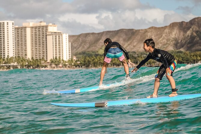 Where Can I Take A Surf Lesson And Ride The Waves In Hawaii?